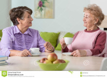 http://www.dreamstime.com/royalty-free-stock-photo-elderly-women-drinking-coffee-sitting-table-image50100155